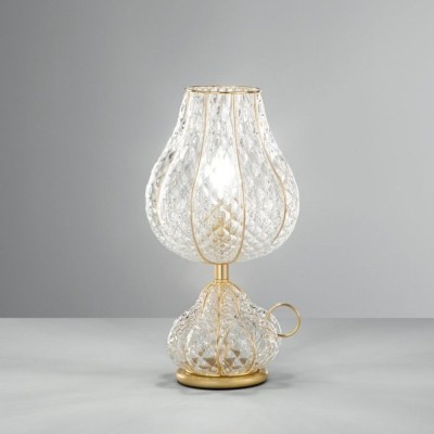 Table lamp with sinuous lines in Venetian blown glass