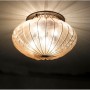 "Harem" ceiling light with lights on